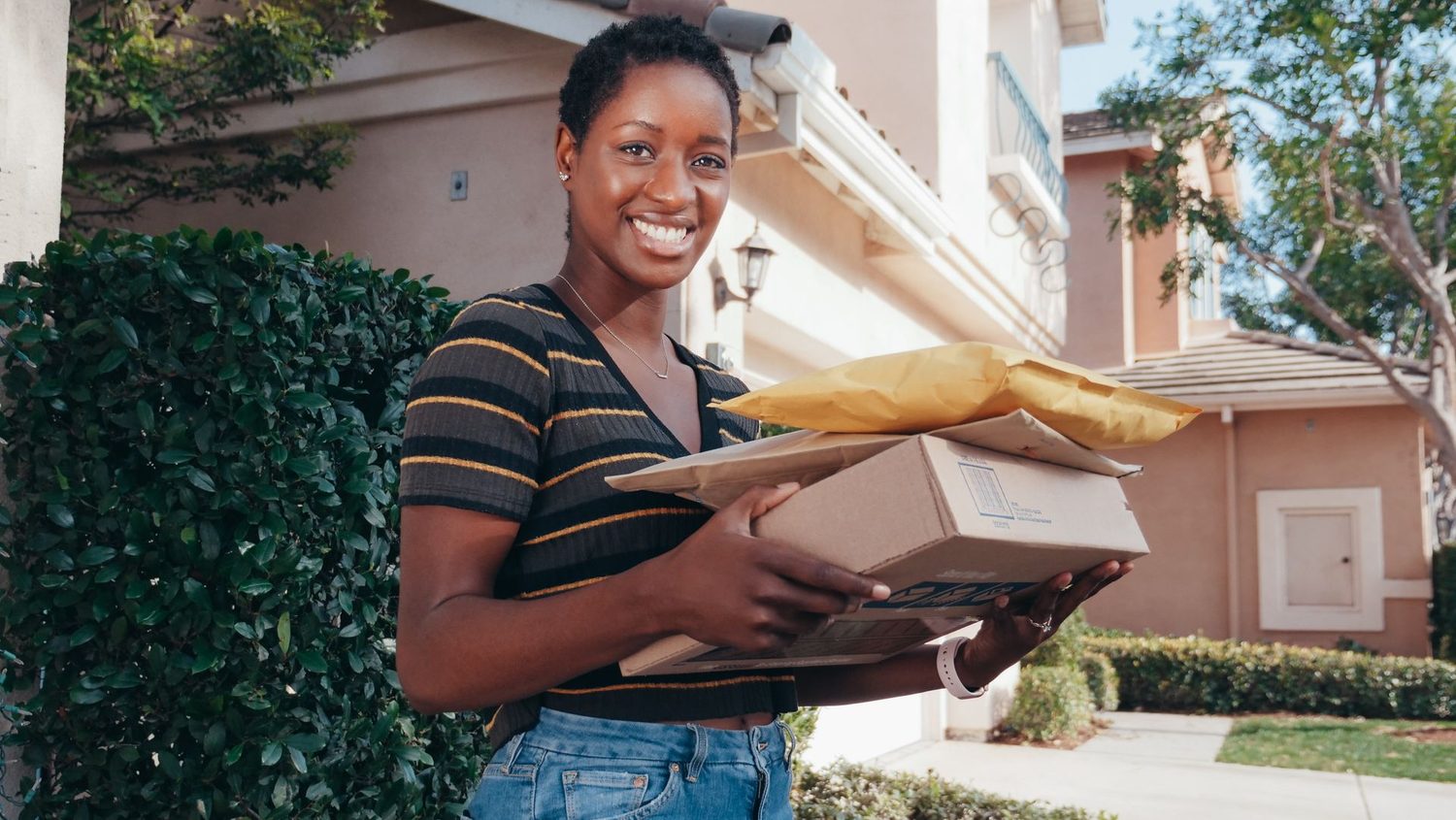 A customer with her AirBaggd parcels ready to send from the US to Ghana